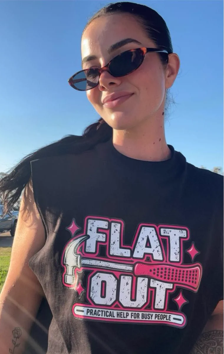 Emily Harmer, founder of Flat Out, wearing a Flat Out shirt